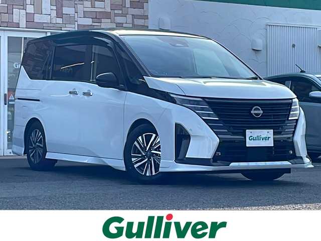 日産 セレナ e－パワー ハイウェイスター V 徳島県 2024(令6)年 1.7万km パールⅡ 純正メモリナビ/（ラジオ/フルセグ/BT/USB/HDMI）/フリップダウンモニター/フロントエアロ/プロパイロット/ブラインドスポットモニター/デジタルインナーミラー/タイプC入力端子/追従式クルーズコントロール/バックカメラ/ビルトインETC/ドライブレコーダー/両側電動スライドドア/前後コーナーセンサー/LEDヘッドライト