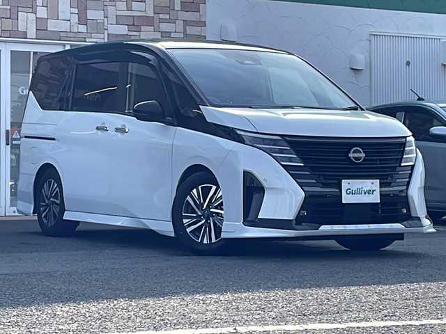 日産 セレナ e－パワー ハイウェイスター V 徳島県 2024(令6)年 1.7万km パールⅡ 純正メモリナビ/（ラジオ/フルセグ/BT/USB/HDMI）/フリップダウンモニター/フロントエアロ/プロパイロット/ブラインドスポットモニター/デジタルインナーミラー/タイプC入力端子/追従式クルーズコントロール/バックカメラ/ビルトインETC/ドライブレコーダー/両側電動スライドドア/前後コーナーセンサー/LEDヘッドライト