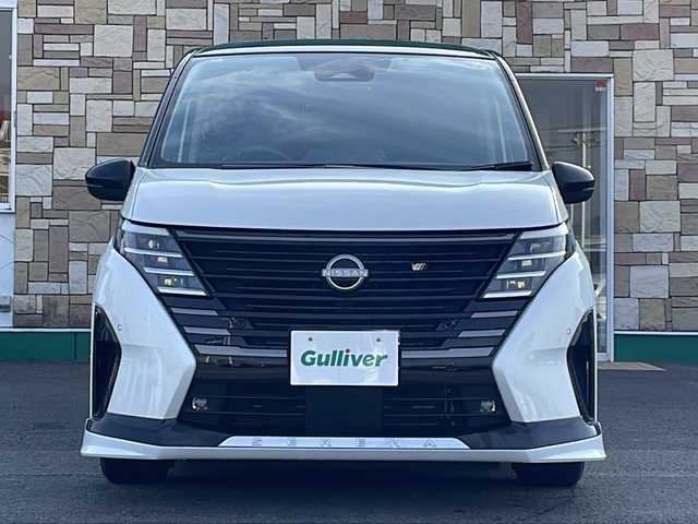 日産 セレナ e－パワー ハイウェイスター V 徳島県 2024(令6)年 1.7万km パールⅡ 純正メモリナビ/（ラジオ/フルセグ/BT/USB/HDMI）/フリップダウンモニター/フロントエアロ/プロパイロット/ブラインドスポットモニター/デジタルインナーミラー/タイプC入力端子/追従式クルーズコントロール/バックカメラ/ビルトインETC/ドライブレコーダー/両側電動スライドドア/前後コーナーセンサー/LEDヘッドライト