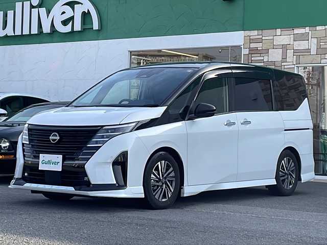 日産 セレナ e－パワー ハイウェイスター V 徳島県 2024(令6)年 1.7万km パールⅡ 純正メモリナビ/（ラジオ/フルセグ/BT/USB/HDMI）/フリップダウンモニター/フロントエアロ/プロパイロット/ブラインドスポットモニター/デジタルインナーミラー/タイプC入力端子/追従式クルーズコントロール/バックカメラ/ビルトインETC/ドライブレコーダー/両側電動スライドドア/前後コーナーセンサー/LEDヘッドライト
