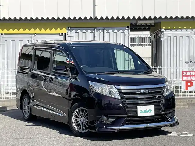 トヨタ ノア X 愛知県 2014(平26)年 12.8万km ボルドーマイカメタリック /禁煙車//MODELLISTAエアロ//純正ディーラーオプションナビ//フルセグTV/CD/DVD/BT/SD//純正フリップダウンモニター//バックカメラ//ビルトインETC//横滑り防止装置//マルチインフォメーションディスプレイ//ECO　MODEスイッチ//MTモード付AT//アイドリングストップ//プッシュスタート//オートリトラクタブルミラー//両側パワースライドドア//純正フロアマット//純正ドアバイザー//純正オートHIDヘッドライト//社外16インチアルミホイール付スタッドレスタイヤ//社外15インチアルミホイール付ノーマルタイヤ有//ステアリングスイッチ//防眩ミラー//照明付バニティミラー//ISOFIX//衝突安全ボディー//UVカットガラス//プライバシーガラス//スマートキー//スペアキー×1//保証書/取扱説明書/ナビ説明書//ディーラー記録簿(H27.28.30.R3.5)//その他記録簿(R1)