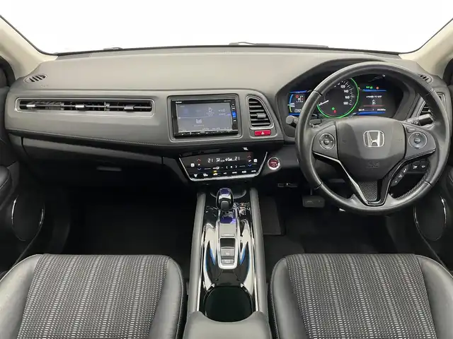 ホンダ ヴェゼル ハイブリッド 愛知県 2016(平28)年 5.7万km ホワイトオーキッドパール 純正7型ナビ/Bluetooth/フルセグテレビ/CD/DVD/ETC/バックカメラ/オートクルーズコントロール/LEDヘッドライト/ホンダセンシング/ハーフレザーシート/シートヒーター/禁煙車