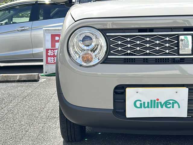 スズキ ラパン X 埼玉県 2022(令4)年 0.9万km フォーンベージュM 走行距離8394km/ワンオーナー/純正8インチナビ(CN-RZ876)/AM/FM/BT/CD/DVD/フルセグTV/アランドビューモニター/シートヒーター（D+N席）/前後ドライブレコーダー/ビルトインETC/ステアリングリモコン/純正14インチアルミホイール/スズキセーフティーアシスト/レーンキープアシスト/衝突被害軽減システム/バックセンサー/横滑り防止装置/アイドリングストップ/先行車発進お知らせ機能/標識認識機能/オートライト/LEDヘッドライト/プッシュスタート/スマートキー×2/電動格納ミラー/純正フロアマット/純正ドアバイザー/保証書/取扱説明書/ナビ取扱説明書