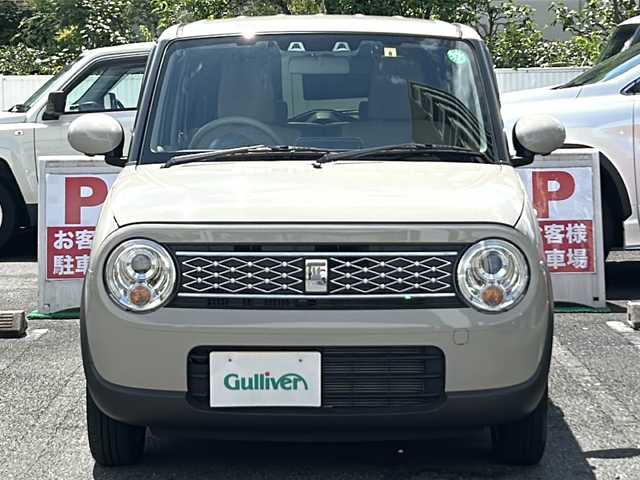 スズキ ラパン X 埼玉県 2022(令4)年 0.9万km フォーンベージュM 走行距離8394km/ワンオーナー/純正8インチナビ(CN-RZ876)/AM/FM/BT/CD/DVD/フルセグTV/アランドビューモニター/シートヒーター（D+N席）/前後ドライブレコーダー/ビルトインETC/ステアリングリモコン/純正14インチアルミホイール/スズキセーフティーアシスト/レーンキープアシスト/衝突被害軽減システム/バックセンサー/横滑り防止装置/アイドリングストップ/先行車発進お知らせ機能/標識認識機能/オートライト/LEDヘッドライト/プッシュスタート/スマートキー×2/電動格納ミラー/純正フロアマット/純正ドアバイザー/保証書/取扱説明書/ナビ取扱説明書