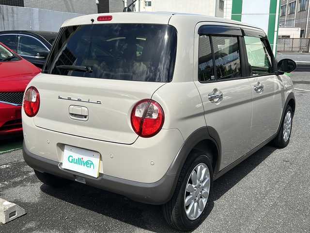 スズキ ラパン X 埼玉県 2022(令4)年 0.9万km フォーンベージュM 走行距離8394km/ワンオーナー/純正8インチナビ(CN-RZ876)/AM/FM/BT/CD/DVD/フルセグTV/アランドビューモニター/シートヒーター（D+N席）/前後ドライブレコーダー/ビルトインETC/ステアリングリモコン/純正14インチアルミホイール/スズキセーフティーアシスト/レーンキープアシスト/衝突被害軽減システム/バックセンサー/横滑り防止装置/アイドリングストップ/先行車発進お知らせ機能/標識認識機能/オートライト/LEDヘッドライト/プッシュスタート/スマートキー×2/電動格納ミラー/純正フロアマット/純正ドアバイザー/保証書/取扱説明書/ナビ取扱説明書