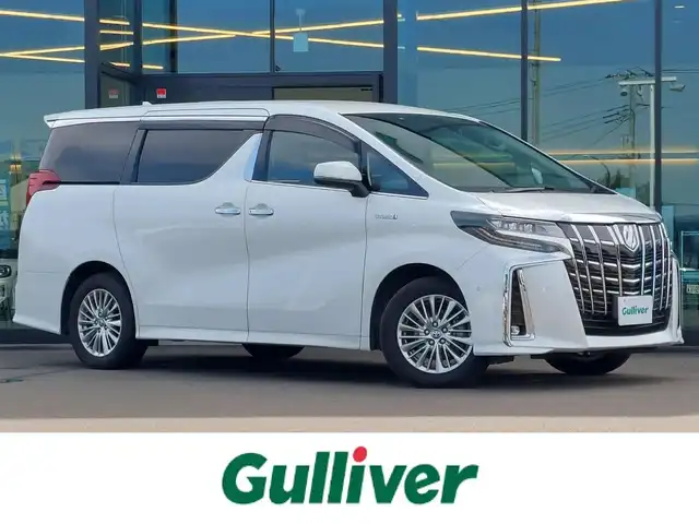 トヨタ アルファードハイブリット SR Cパッケージ 東京都 2020(令2)年 3.8万km ホワイトパールクリスタルシャイン JBLプレミアムサウンド/純正ナビ/　（フルセグTV/CD/DVD/BT/USB）/リアエンターテインメント/トヨタセーフティセンス/・プリクラッシュセーフティ/・レーントレーシングアシスト/・レーダークルーズコントロール/・レーンディパーチャーアラート/・オートマチックハイビーム/・ロードサインアシスト/・ブラインドスポットモニター/パノラミックビューモニター/ドライブレコーダー/デジタルインナーミラー/ETC2.0/運転席メモリー機能付きパワーシート/前席シートヒーター/シートベンチレーション/ステアリングヒーター/革巻きステアリング/純正１７インチアルミホイール/ステアリングスイッチ/電動格納ウインカーミラー/リアプライバシーガラス/LEDヘッドライト/ドアバイザー/新車時保証書