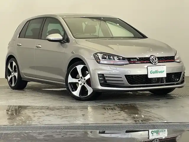 フォルクスワーゲン ゴルフ ＧＴＩ 栃木県 2014(平26)年 7.2万km グレー 純正ナビ/(CD/DVD/フルセグTV/Bluetooth/SD/AUX/USB)/衝突軽減ブレーキ/前後コーナーセンサー/ビルトインETC/禁煙車/オートライト/HIDヘッドライト/パドルシフト/スマートキー/プッシュスタート/アイドリングストップ/ステアリングスイッチ/革巻きステアリング/ウィンカーミラー/電動格納ミラー/純正18インチアルミホイール/純正フロアマット