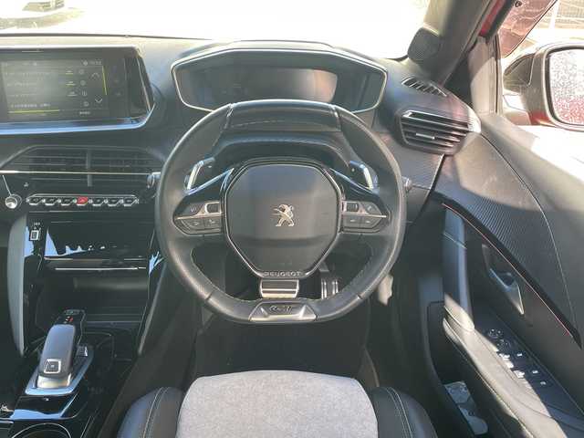プジョー プジョー ２０８ GT 福岡県 2021(令3)年 4.7万km 赤 ディスプレイオーディオ/Bluetooth/MirrorLink/AndroidAuto/AppleCarplay/AM/FM/USB/iPod/ドライブモード/ハンズフリー/シートヒーター（D/N)/電動格納ミラー/プッシュスタート/レーンキープアシスト/オートライト/パドルシフト/ETC/ドライブレコーダー/パーキングセンサー/アイドリングストップ/インテリジェントハイビーム