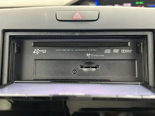 ホンダ フリード ハイブリット EX 千葉県 2016(平28)年 7.7万km ホワイトオーキッドパール 禁煙　/両側電動スライドドア　/シートヒーター　/ＬＥＤヘッドライト/ホンダセンシング/レーダークルーズコントロール　/社外７型ナビ（MDV-D403）/Ｃパッケージ　/Ｓパッケージ　/コンフォートビューパッケージ　/ビルトインＥＴＣ/ワンセグＴＶ　/バックカメラ/カーテンエアバック/リアサンシェード/電動格納サイドミラー/2列目キャプテンシート/アイドリングストップ/ウィンカーミラー/プッシュスタート