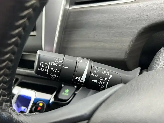 ホンダ フリード ハイブリット EX 千葉県 2016(平28)年 7.7万km ホワイトオーキッドパール 禁煙　/両側電動スライドドア　/シートヒーター　/ＬＥＤヘッドライト/ホンダセンシング/レーダークルーズコントロール　/社外７型ナビ（MDV-D403）/Ｃパッケージ　/Ｓパッケージ　/コンフォートビューパッケージ　/ビルトインＥＴＣ/ワンセグＴＶ　/バックカメラ/カーテンエアバック/リアサンシェード/電動格納サイドミラー/2列目キャプテンシート/アイドリングストップ/ウィンカーミラー/プッシュスタート