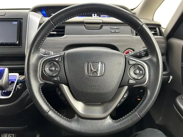 ホンダ フリード ハイブリット EX 千葉県 2016(平28)年 7.7万km ホワイトオーキッドパール 禁煙　/両側電動スライドドア　/シートヒーター　/ＬＥＤヘッドライト/ホンダセンシング/レーダークルーズコントロール　/社外７型ナビ（MDV-D403）/Ｃパッケージ　/Ｓパッケージ　/コンフォートビューパッケージ　/ビルトインＥＴＣ/ワンセグＴＶ　/バックカメラ/カーテンエアバック/リアサンシェード/電動格納サイドミラー/2列目キャプテンシート/アイドリングストップ/ウィンカーミラー/プッシュスタート