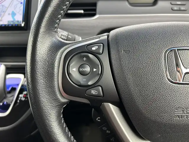 ホンダ フリード ハイブリット EX 千葉県 2016(平28)年 7.7万km ホワイトオーキッドパール 禁煙　/両側電動スライドドア　/シートヒーター　/ＬＥＤヘッドライト/ホンダセンシング/レーダークルーズコントロール　/社外７型ナビ（MDV-D403）/Ｃパッケージ　/Ｓパッケージ　/コンフォートビューパッケージ　/ビルトインＥＴＣ/ワンセグＴＶ　/バックカメラ/カーテンエアバック/リアサンシェード/電動格納サイドミラー/2列目キャプテンシート/アイドリングストップ/ウィンカーミラー/プッシュスタート