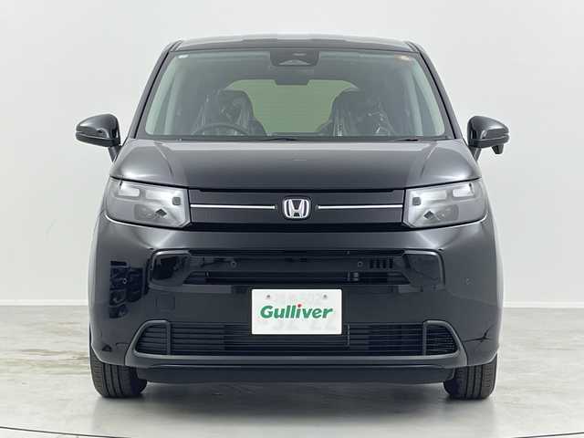 ホンダ フリード ハイブリット e:HEV AIR EX 福島県 2025(令7)年 0.1千km クリスタルブラックパール /登録済未使用車//純正９インチナビ　//両側パワースライドドア　//衝突被害軽減ブレーキ　//アダプティブクルーズコントロール　//シートヒーター(D/N)//コーナーセンサー(前後)//バックカメラ　//ＵＳＢ入力端子　//ＬＥＤヘッドライト//ステアリングリモコン//取扱説明書//保証書