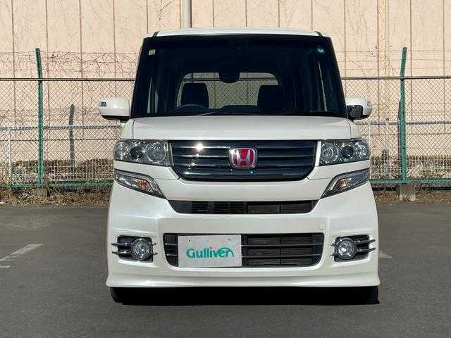 ホンダ Ｎ ＢＯＸ カスタム ターボ SSパッケージ 東京都 2014(平26)年 5.4万km プレミアムホワイトパール 純正ナビ/両側パワースライドドア/車高調/HIDヘッドライト/スマートキー/シートヒーター/シティブレーキアクティブシステム/フルセグTV/Bluetoothオーディオ/CD/DVD再生/オートライト/オートエアコン