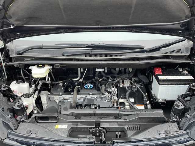 トヨタ ヴォクシー ハイブリッド S－Z 山口県 2023(令5)年 5.3万km アティチュードブラックマイカ ワンオーナー/純正メモリナビ/　Bluetooth、CD、DVD、HDMI、フルセグテレビ/両側パワースライドドア/バックカメラ/フリップダウンモニター/前後ドライブレコーダー【DC-DR652】/ビルトインETC2.0/レーダークルーズコントロール/電動リアゲート/ステアリングスイッチ/ステアリングホールド/AC100V×２/タイプC充電口×２/アイドリングストップ/スマートキー/スペアキー1本/ドアバイザー/ハーフレザーシート/シートヒーター【D＋N+2列目】/純正17インチアルミホイール/レーンキープアシスト/ブラインドスポットアシスト/パーキングアシスト/コーナーセンサー/プリクラッシュセーフティ