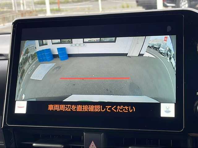 トヨタ ヴォクシー ハイブリッド S－Z 山口県 2023(令5)年 5.3万km アティチュードブラックマイカ ワンオーナー/純正メモリナビ/　Bluetooth、CD、DVD、HDMI、フルセグテレビ/両側パワースライドドア/バックカメラ/フリップダウンモニター/前後ドライブレコーダー【DC-DR652】/ビルトインETC2.0/レーダークルーズコントロール/電動リアゲート/ステアリングスイッチ/ステアリングホールド/AC100V×２/タイプC充電口×２/アイドリングストップ/スマートキー/スペアキー1本/ドアバイザー/ハーフレザーシート/シートヒーター【D＋N+2列目】/純正17インチアルミホイール/レーンキープアシスト/ブラインドスポットアシスト/パーキングアシスト/コーナーセンサー/プリクラッシュセーフティ