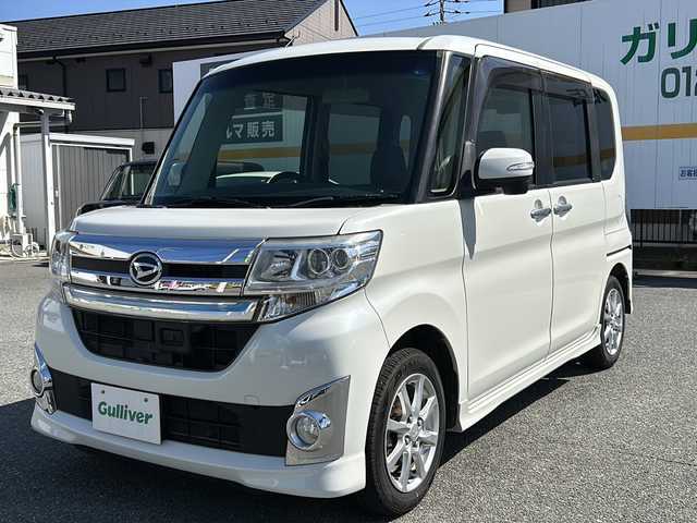 ダイハツ タント カスタム X トップED SA 山口県 2014(平26)年 13.1万km パールホワイトⅢ 社外ナビ/DVD/CD/BT/USB/フルセグTV/バックカメラ/左後ろパワースライドドア/純正HIDヘッドライト/純正フォグランプ/オートライト/純正１４インチアルミホイール/ステアリングスイッチ/黒革調シートカバー/衝突被害軽減ブレーキ/横滑り防止/アイドリングストップ/スマートキー/フロアマット/ドアバイザー/ETC/電動格納ウインカードアミラー
