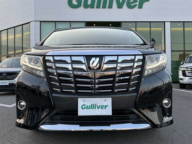 トヨタ アルファード G 愛媛県 2015(平27)年 5.9万km ブラック 登録時走行距離:58776km/純正ナビ/AM/FM/フルセグTV/Bluetooth/バックカメラ/アイドリングストップ/横滑り防止装置/クルーズコントロール/LEDヘッドライト/オートライト/両側パワースライドドア/エンジンスタートボタン/スマートキー/純正アルミホイール/純正フロアマット/前後コーナーセンサー