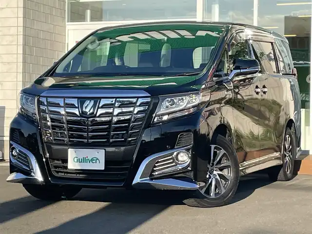トヨタ アルファードハイブリット SR 道央・札幌 2015(平27)年 9.1万km ブラック ・４WD/・衝突軽減ブレーキ/・寒冷地仕様/・純正ナビ/　CD＆DVD＆BT＆TV/・バックカメラ/・ハーフレザーシート/・パワーシート/・パワーバックドア/・フリップダウンモニター/・両側パワースライドドア/・レーダークルーズコントロール/・コーナーセンサー/・レーンキープアシスト/・前方ドライブレコーダー/・ワイパー熱線/・オートエアコン/・オートライト/・MT付きAT/・ビルトインETC/・オートリトラミラー/・プッシュスタート/・スマートキー/・JBLプレミアムサウンド/・純正フロアマット/・ドアバイザー/・ウィンカーミラー/・フォグライト/・LEDヘッドライト/・スペアキー