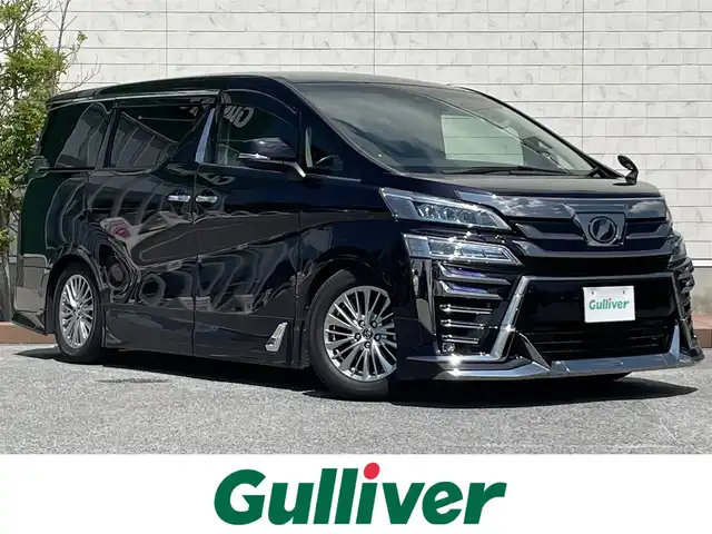 トヨタ ヴェルファイア Z Gエディション 滋賀県 2018(平30)年 13.8万km スパークリングブラックパールクリスタルシャイン 社外11インチナビ/（FM/AM/CD/DVD/フルセグ/Bluetooth）/モデリスタフルエアロ/バックカメラ/ETC/前後ドライブレコーダー/両側パワースライドドア/積込冬用タイヤ/ステアリングスイッチ/ステアリングヒーター/クルーズコントロール/電子パーキング/ブレーキホールド/電動格納ミラー/電動リアゲート/オートライト/LEDヘッドライト/フロントフォグ/オートハイビーム/シートメモリー/プッシュスタート/スマートキー/純正フロアマット/ドアバイザー/TEIN製車高調/社外マフラー