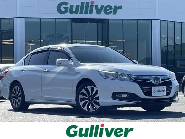 ホンダ アコード ハイブリッド EX 島根県 2014(平26)年 11.5万km ホワイトオーキッドパール 登録時走行距離114674km/純正ナビ(Bluetooth・AM・FM・CD)/フルセグTV/バックカメラ/ETC/電動リアサンシェード/前席パワーシート/社外フロアマット/純正17インチAW/アイドリングストップ/レーダークルーズコントロール/前後コーナーセンサー/レーンキープアシスト/衝突被害軽減ブレーキ/横滑り防止装置/オートライト/LEDヘッドライト/プッシュスタート/取扱説明書