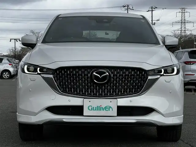 マツダ ＣＸ－５ XD エクスクルーシブモード 道央・札幌 2025(令7)年 1万km ロジウムホワイトプレミアムメタリック ４WD/ワンオーナー/BOSEサウンド/純正メモリーナビ/AM/FM/BT/フルセグ/衝突被害軽減ブレーキ/レーダークルーズコントロール/横滑り防止装置/レーンキープアシスト/クリアランスソナー/ブラインドスポットモニター/バックカメラ/サイドカメラ/フロントカメラ/全方位カメラ/アラウンドビューモニター/ETC/ドライブレコーダー/アイドリングストップ/パワーバックドア/前席パワーシート/D席メモリーシート/全席シートヒーター/前席エアシート/レザーシート/革巻きステアリング/ステアリングリモコン/パドルシフト/ハンドルヒーター/電動パーキング/オートブレーキホールド/自動防眩ミラー/MTモード付AT/プッシュスタート/スマートキー/LEDヘッドライト/オートライト/オートマチックハイビーム/電動格納ミラー/ウィンカーミラー/純正フロアマット/スペアキー/純正エンジンスターター
