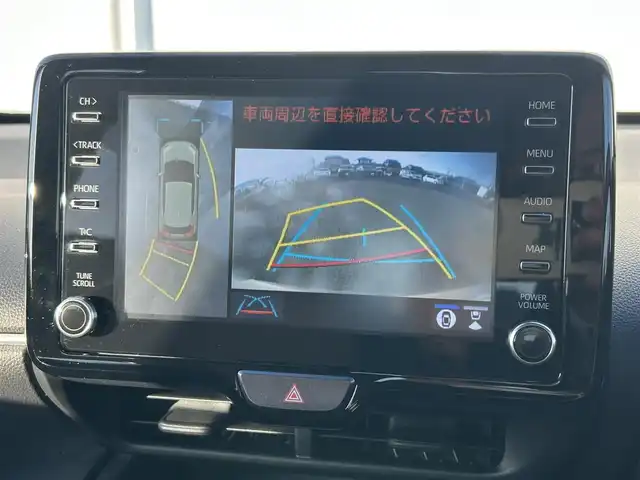 トヨタ ヤリスクロス ハイブリッド Z アドベンチャー 熊本県 2023(令5)年 1.2万km ブラックマイカ/ベージュ 2トーン 純正ナビ/・AM/FM/CD/USB/BT/・AppleCarPlay/AndroidAuto/・フルセグTV/全周囲カメラ/・フロント/サイド/バック/トヨタセーフティセンス/・レーントレーシングアラート/・プリクラッシュセーフティシステム/・ブラインドスポットモニター/・クリアランスソナー/・リヤクロストラフィックアラート/・パーキングサポートブレーキ/・ロードサインアシスト/・車両接近通報装置/・オートマチックハイビーム/・レーダークルーズコントロール/前後コーナーセンサー/革巻きステアリング/・ステアリングリモコン/・ステアリングヒーター/オートライト/・LEDライト/・ヘッドライトレベライザー/純正ETC/ハーフレザーシート/・D/N席シートヒーター/・D席パワーシート/前後ドライブレコーダー（TZ-DR210）/電動格納ミラー/・ウィンカーミラー/ドアバイザー/純正アルミホイール/純正フロアマット/スマートキー