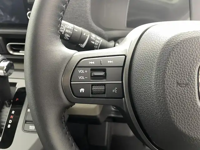 ホンダ フリード ハイブリット 福島県 2025(令7)年 0.1千km クリスタルブラックパール ホンダセンシング/・衝突軽減ブレーキ/・アダプティブクルーズコントロール/・先行車発進お知らせ/・歩行者事故低減ステアリング/・レーンキープアシスト/・標識認識機能/・トラフィックジャムアシスト/・BSM/・誤発進抑制/・後方誤発進抑制/・急アクセル抑制/・パーキングセンサー/純正9インチメモリーナビ/型式：LXM-242ZFNi/・フルセグTV/・Bluetooth/・FM/AM/・AppleCarPlay/・androidオート/・ステアリングスイッチ/・USB/両側パワースライドドア/LEDヘッドライト/・オートライト/・オートマチックハイビーム/前席シートヒーター/純正15インチホイール/サーキュレーター/プッシュスタート/・スマートキー/・スペアキー