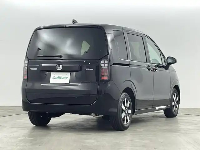 ホンダ フリード ハイブリット 福島県 2025(令7)年 0.1千km クリスタルブラックパール ホンダセンシング/・衝突軽減ブレーキ/・アダプティブクルーズコントロール/・先行車発進お知らせ/・歩行者事故低減ステアリング/・レーンキープアシスト/・標識認識機能/・トラフィックジャムアシスト/・BSM/・誤発進抑制/・後方誤発進抑制/・急アクセル抑制/・パーキングセンサー/純正9インチメモリーナビ/型式：LXM-242ZFNi/・フルセグTV/・Bluetooth/・FM/AM/・AppleCarPlay/・androidオート/・ステアリングスイッチ/・USB/両側パワースライドドア/LEDヘッドライト/・オートライト/・オートマチックハイビーム/前席シートヒーター/純正15インチホイール/サーキュレーター/プッシュスタート/・スマートキー/・スペアキー