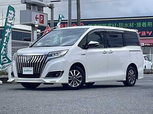 トヨタ エスクァイア ハイブリッド Gi プレミアムパッケージ 愛知県 2017(平29)年 7万km ホワイトパールクリスタルシャイン /禁煙/ワンオーナー//ディーラー整備記録簿/H30.R1.2.3.4.5.6//純正10インチナビ/フルセグ/CD/DVD/SD/MSV//HDMI/USB/バックカメラ/ビルトインETC//ドライブレコーダー/純正12インチフリップダウンモニタ//両側パワースライドドア//茶ハーフレザーシート/シートヒーター//コンビステア/ステアリングスイッチ/ステアヒーター//純正LEDオートライト/オートハイビーム//純正LEDフォグ//リアロールサンシェード//オートリトタウインカーミラー//フロント・リアエアロ//GPSレーダー探知機//アルパインツィーター//ドライブサポートイルミネーション//PCS/LDA/クルーズコントロール//自動防眩ルームミラー//照明付きバニティミラー//純正15インチAW//新車時保証書//取扱説明書//スペアスマートキー