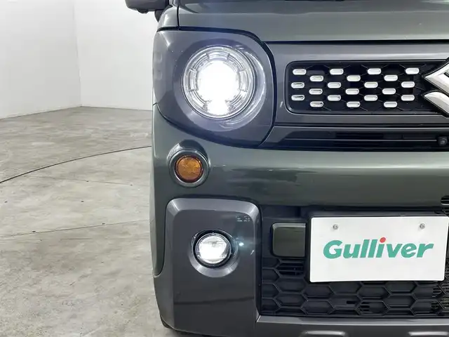 スズキ スペーシア ギア HYBRID XZターボ 福島県 2021(令3)年 6万km クールカーキパールメタリック/ガンメタリック2トーン ワンオーナー/ルーフレール/スズキセーフティサポート/・デュアルカメラブレーキサポート/・誤発進抑制機能（前方・後方）/・後退時ブレーキサポート/・車線逸脱警報機能/・車線逸脱抑制機能/・ふらつき警報機能/・標識認識機能/・フロントガラス投影式ヘッドアップディスプレイ/・先行車発進お知らせ機能/・ハイビームアシスト/・アダプティブクルーズコントロール（全車速追従機能付き）/純正ナビ/・型番：CN-R2765W/・フルセグ/CD/DVD/SD/BT/FM/AM/・ETC/・全方位カメラ/両側パワースライドドア/革巻きステアリング/・ステアリングスイッチ/・パドルシフト/前席シートヒーター/LEDヘッドライト/・フォグランプ/・オートライト/プッシュスタート/・スマートキー/・アイドリングストップ/純正マット/ドアバイザー