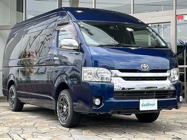 トヨタ ハイエース グランドキャビン 静岡県 2015(平27)年 2.3万km ダークブルーマイカM 社外ナビ(イクリプス)/・TV/・FM/AM/・Bluetooth/・CD/DVD/・SD/・USB/主要装備/・ＭＧＲベッドキット/・後付けハンガーラック/・後付けリアオートエアコン/・TOYOホワイトレタータイヤ/・１６インチ社外ＡＷ/・片側パワスラ/・ＬＥＤヘッドライト/・１００V電源/・フォグランプ/・ソケット電源増設/・LEDヘッドライト/・フォグランプ/・オートエアコン/・ETC/・フローリング調フロアマット