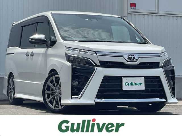 トヨタ ヴォクシー ZS 煌Ⅱ 愛媛県 2019(平31)年 3.5万km ホワイトパールクリスタルシャイン プリクラッシュセーフティ/レーンディパーチャーアラート/クリアランスソナー/オートマチックハイビーム/クルーズコントロール/純正9インチSDナビ【NSZT-Y68T】/　CD/DVD/Bluetooth/フルセグTV/バックカメラ/ビルトインETC/純正12.1型フリップダウンモニター/社外360°ドライブレコーダー/両側パワースライドドア/オートライト/LEDヘッドライト/革調シートカバー/社外18インチAW(ROJAM)/車高調/社外ステアリング/ステアリングスイッチ/プッシュスタート/フロアマット