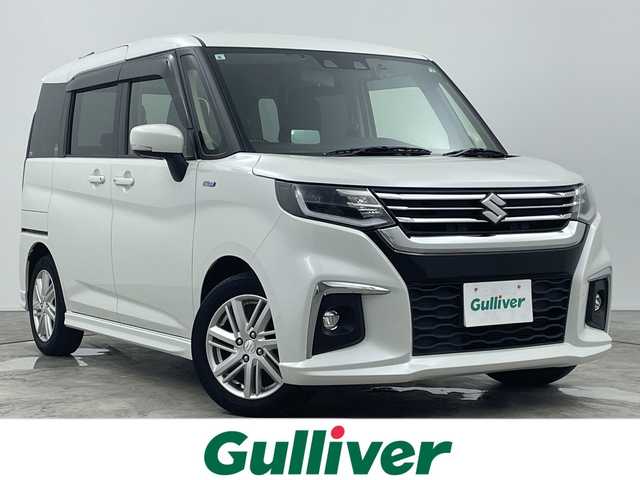 スズキ ソリオ HV MZ 三重県 2021(令3)年 3.5万km ピュアホワイトP 禁煙車/純正8インチナビ/バックカメラ/フルセグ/レーダークルーズコントロール/衝突軽減ブレーキ/レーンキープアシスト/コーナーセンサー/オートハイビーム/ヘッドアップディスプレイ/シートヒーター/両側パワースライドドア/ドライブレコーダー/ETC/スマートキー×２
