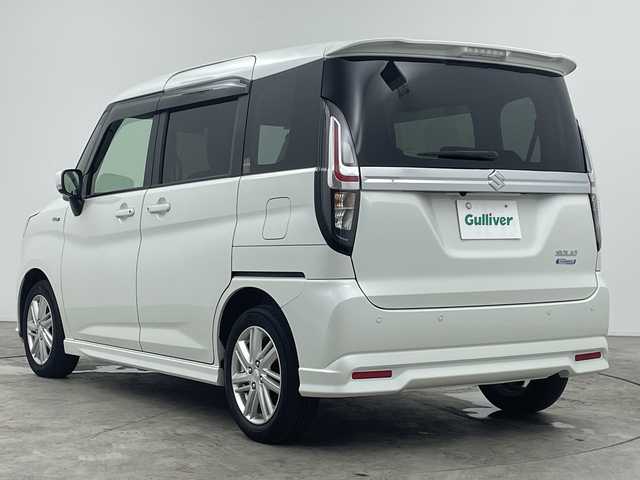 スズキ ソリオ HV MZ 三重県 2021(令3)年 3.5万km ピュアホワイトP 禁煙車/純正8インチナビ/バックカメラ/フルセグ/レーダークルーズコントロール/衝突軽減ブレーキ/レーンキープアシスト/コーナーセンサー/オートハイビーム/ヘッドアップディスプレイ/シートヒーター/両側パワースライドドア/ドライブレコーダー/ETC/スマートキー×２
