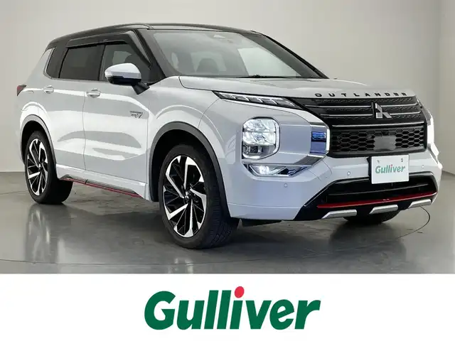 三菱 アウトランダー ＰＨＥＶ P 愛知県 2022(令4)年 1.8万km パールⅡ 純正９型ナビ　全方位カメラ　ＢＯＳＥ　パノラマサンルーフ　ラリアートスタイルエアロ　マイパイロット　e-Assist　衝突軽減　追従クルコン BSM　HUD　誤発進抑制　パドルシフト　フルセグ　カープレイ　革シート　シートヒーターリフレッシュ機能　電動リアゲート　ワイヤレス充電　ミラー型前後ドラレコ　コーナーセンサー　LEDオートライト　禁煙車