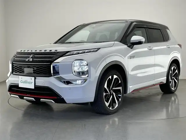 三菱 アウトランダー ＰＨＥＶ P 愛知県 2022(令4)年 1.8万km パールⅡ 純正９型ナビ　全方位カメラ　ＢＯＳＥ　パノラマサンルーフ　ラリアートスタイルエアロ　マイパイロット　e-Assist　衝突軽減　追従クルコン BSM　HUD　誤発進抑制　パドルシフト　フルセグ　カープレイ　革シート　シートヒーターリフレッシュ機能　電動リアゲート　ワイヤレス充電　ミラー型前後ドラレコ　コーナーセンサー　LEDオートライト　禁煙車