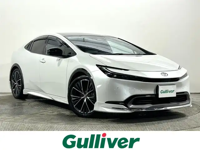 トヨタ プリウス Z 大阪府 2024(令6)年 1.2万km プラチナホワイトパールマイカ サンルーフ　黒革シート　モデリスタエアロ　純正ナビＴＶ　３６０カメラ　ＥＴＣ　デジタルインナーミラー　パワーシート／ヒーター／エアコン　電動リアゲート　衝突軽減　レーダーＣ　ＢＳＭ　パークアシスト