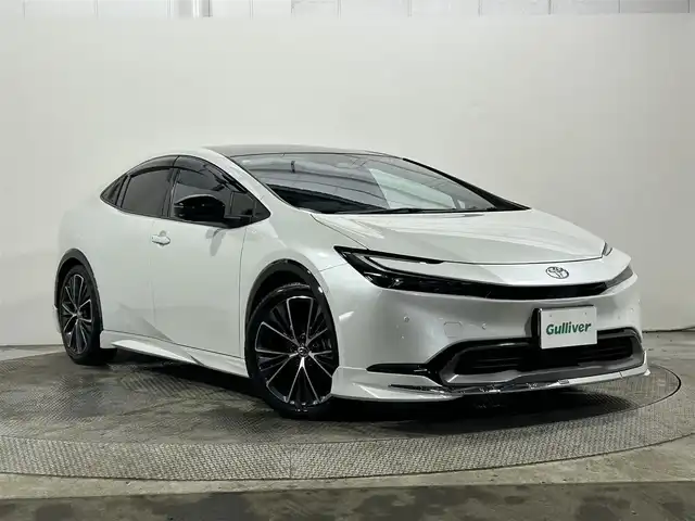 トヨタ プリウス Z 大阪府 2024(令6)年 1.1万km プラチナホワイトパールマイカ 純正ナビ/衝突軽減/全方位カメラ/バックカメラ/ETC/サンルーフ/モデリスタエアロ/シートヒーター/レーダクルコン/コーナーセンサー/革シート/バックカメラ/パワーシート/レーンアシスト/LEDヘッドライト/電動リアゲート/プッシュスタート/スマートキー/オートライト/オートエアコン/電動ミラー/エアシート/ハンドルヒーター/LEDフォグランプ/純正アルミホイール