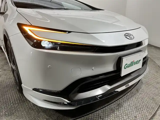 トヨタ プリウス Z 大阪府 2024(令6)年 1.1万km プラチナホワイトパールマイカ 純正ナビ/衝突軽減/全方位カメラ/バックカメラ/ETC/サンルーフ/モデリスタエアロ/シートヒーター/レーダクルコン/コーナーセンサー/革シート/バックカメラ/パワーシート/レーンアシスト/LEDヘッドライト/電動リアゲート/プッシュスタート/スマートキー/オートライト/オートエアコン/電動ミラー/エアシート/ハンドルヒーター/LEDフォグランプ/純正アルミホイール