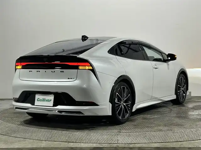 トヨタ プリウス Z 大阪府 2024(令6)年 1.1万km プラチナホワイトパールマイカ 純正ナビ/衝突軽減/全方位カメラ/バックカメラ/ETC/サンルーフ/モデリスタエアロ/シートヒーター/レーダクルコン/コーナーセンサー/革シート/バックカメラ/パワーシート/レーンアシスト/LEDヘッドライト/電動リアゲート/プッシュスタート/スマートキー/オートライト/オートエアコン/電動ミラー/エアシート/ハンドルヒーター/LEDフォグランプ/純正アルミホイール