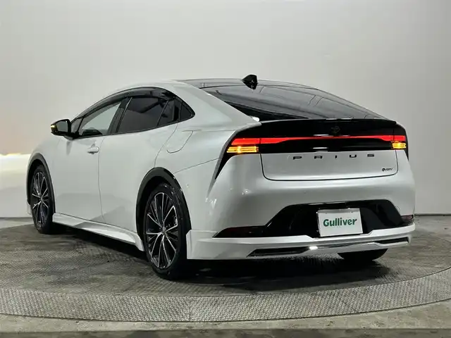 トヨタ プリウス Z 大阪府 2024(令6)年 1.1万km プラチナホワイトパールマイカ 純正ナビ/衝突軽減/全方位カメラ/バックカメラ/ETC/サンルーフ/モデリスタエアロ/シートヒーター/レーダクルコン/コーナーセンサー/革シート/バックカメラ/パワーシート/レーンアシスト/LEDヘッドライト/電動リアゲート/プッシュスタート/スマートキー/オートライト/オートエアコン/電動ミラー/エアシート/ハンドルヒーター/LEDフォグランプ/純正アルミホイール