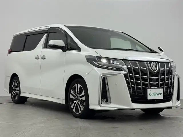 トヨタ アルファード S Cパッケージ 愛知県 2018(平30)年 6万km ホワイトパールクリスタルシャイン 純正10インチナビ/（CD/DVD/BT/フルセグ）/パワーバックドア/純正後席モニター/バックカメラ/ETC/ドラレコ/クルコン/両側パワースライドドア/１，２列目パワーシート/オットマン/２列目キャプテンシート/前席シートヒーター/前席シートクーラー/ステアリングヒーター/トヨタセーフティセンス/ドアバイザー