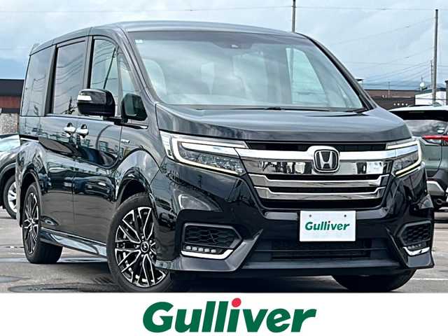 ホンダ ステップワゴン スパーダ ハイブリッド G ホンダセンシング 道南・函館 2018(平30)年 3.7万km プレミアムスパークルブラックパール ・衝突被害軽減ブレーキ/・レーダークルーズコントロール/・レーンキープアシスト/・社外メモリナビ/・フルセグＴＶ/・バックカメラ/・ETC/・両側パワースライドドア/・ALPINE製フリップダウンモニター/・純正AW付冬タイヤ積込/・純正エンジンスターター/・LEDヘッドライト/・フロントフォグランプ/・スマートキー/・エンジンプッシュスタート