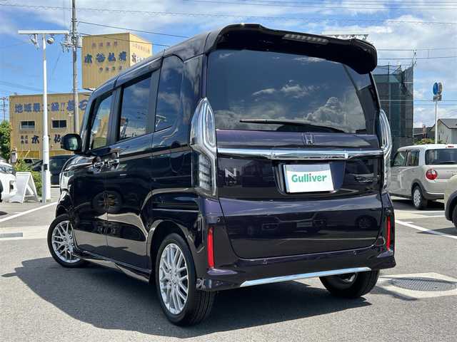 ホンダ Ｎ ＢＯＸ カスタム L ターボ 愛媛県 2022(令4)年 1.6万km プレミアムベルベットパープル・パール 禁煙車/登録時走行距離：15276km/ETC/追従型クルーズコントロール/ディーラーOP純正ナビ/BT/AM・FM/CD/DVD/ふるせぐ/前後ドライブレコーダー/コーナーセンサー/両側パワースライドドア/フォグランプ/純正アルミホイール/純正フロアマット/バックカメラ/LEDヘッドライト/シートヒーター