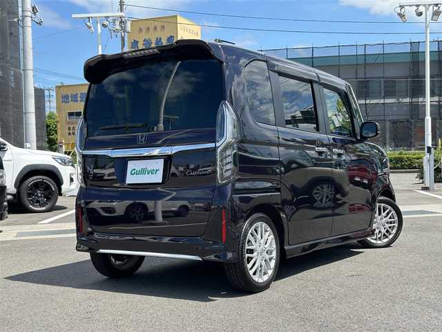ホンダ Ｎ ＢＯＸ カスタム L ターボ 愛媛県 2022(令4)年 1.6万km プレミアムベルベットパープル・パール 禁煙車/登録時走行距離：15276km/ETC/追従型クルーズコントロール/ディーラーOP純正ナビ/BT/AM・FM/CD/DVD/ふるせぐ/前後ドライブレコーダー/コーナーセンサー/両側パワースライドドア/フォグランプ/純正アルミホイール/純正フロアマット/バックカメラ/LEDヘッドライト/シートヒーター