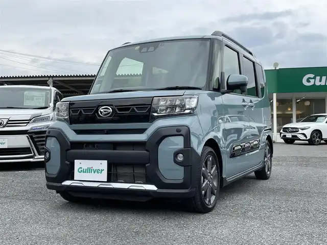 ダイハツ タント ファンクロスターボ 千葉県 2022(令4)年 1.7万km レイクブルーメタリック スマートアシスト/・衝突軽減ブレーキ/・車線逸脱警報/・オートマチックハイビーム/・アダプティブクルーズコントロール/純正ディスプレイオーディオ/・Bluetooth/フルセグTV/パノラミックビューカメラ/両後パワースライドドア/スマートキー/前後コーナーセンサー/ルーフレール/純正ドライブレコーダー/ビルトインETC/純正15インチアルミホイール/純正LEDヘッドライト/フォグランプ/本革巻きステアリング/ヘッドライトレベライザー/サイド＆カーテンエアバッグ