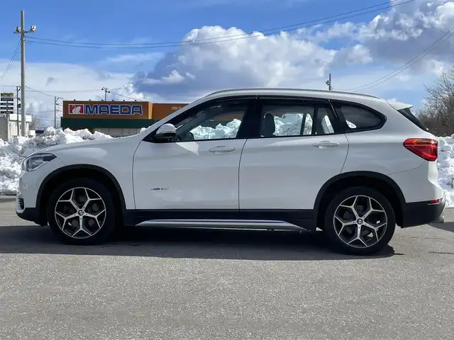 ＢＭＷ Ｘ１ 青森県 2017(平29)年 8.5万km アルピンホワイトⅢ 衝突軽減ブレーキ/LKA/Pアシスト/Bカメラ/純正HDDナビ/BT/DVD/純正18インチAW