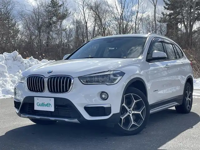 ＢＭＷ Ｘ１ 青森県 2017(平29)年 8.5万km アルピンホワイトⅢ 衝突軽減ブレーキ/LKA/Pアシスト/Bカメラ/純正HDDナビ/BT/DVD/純正18インチAW