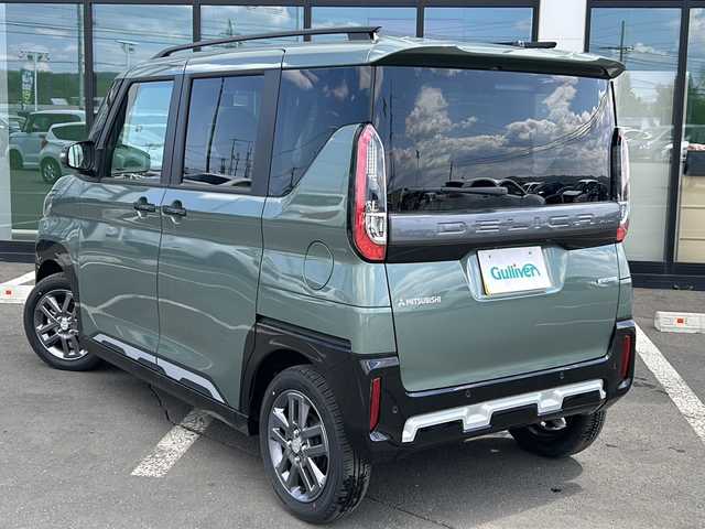 三菱 デリカミニ T プレミアム 道東・釧路十勝 2025(令7)年 0.1万km未満 緑 ・4WD/・純正9インチディスプレイオーディオ/(Android・AU to car play・BT・FM・AM)/・全方位カメラ＋バックカメラ/・追従式クルーズコントロール/・衝突被害軽減システム/・車線逸脱警報/・車線逸脱防止支援/・アクティブスタビリティコントロール/・先行車発進お知らせ/・速度標識表示道路標識表示/・ふらつき警報/・ヒルディセントコントロール/・両側パワースライドドア/・オートスライドドア/・LEDヘッドライト/・フォグライト/・オートライト/・オートマチックハイビーム/・ヘッドライトレベライザー/・ステアリングヒーター/・ステアリングヒーター/・ステアリングスイッチ/・アイドリングストップ/・電格ウィンカーミラー/・スマートキー